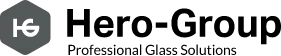 Logo der Firma Hero-Group in schwarzer Schrift, links ein graues Sechseck mit den Firmeninitialien "HG"